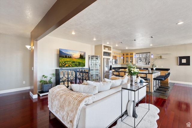 442 E Brew Rd, Draper, UT 84020 - living area with baseboards, dark wood-type flooring, a textured ceiling, and recessed lighting