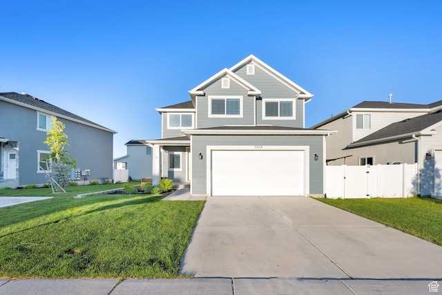 7208 N Silver Spring Way, Eagle Mountain, UT 84005 - view of front of house featuring a garage and concrete driveway