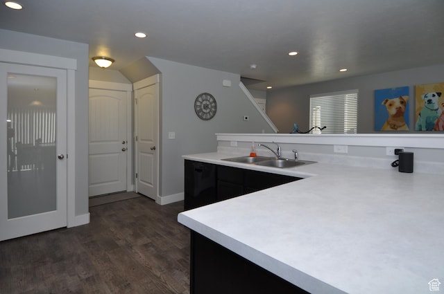 5213 W Courtly Ln, Herriman, UT 84096 - kitchen featuring a sink, light countertops, recessed lighting, dark wood-style flooring, and dark cabinetry