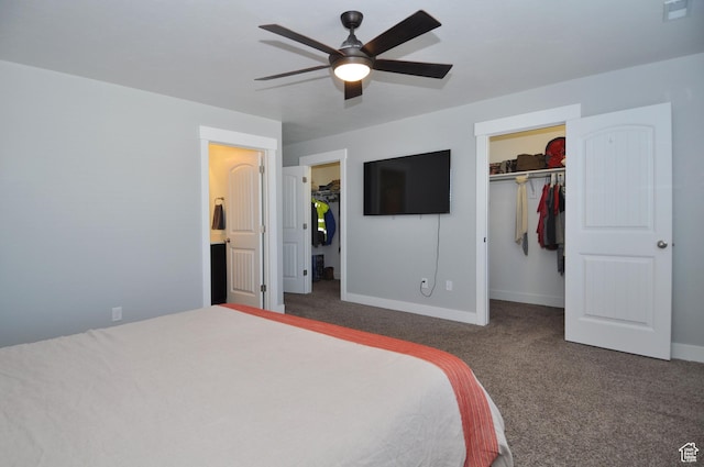 5213 W Courtly Ln, Herriman, UT 84096 - bedroom featuring a spacious closet, carpet flooring, baseboards, a closet, and a ceiling fan