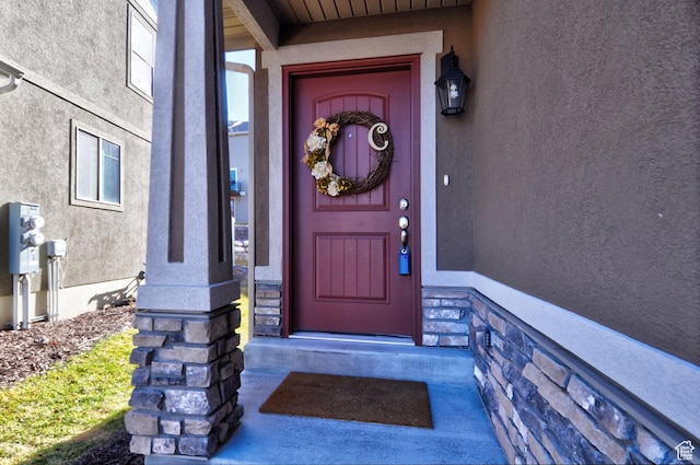 5213 W Courtly Ln, Herriman, UT 84096 - view of exterior entry with stucco siding and stone siding