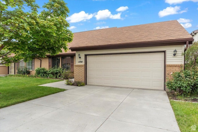 1154 N 700 W, Centerville, UT 84014 - ranch-style home with brick siding, a front lawn, concrete driveway, and a garage