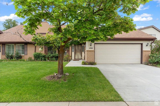 1154 N 700 W, Centerville, UT 84014 - obstructed view of property with brick siding, an attached garage, concrete driveway, and a front lawn
