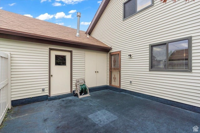 1154 N 700 W, Centerville, UT 84014 - entrance to property with a patio and roof with shingles