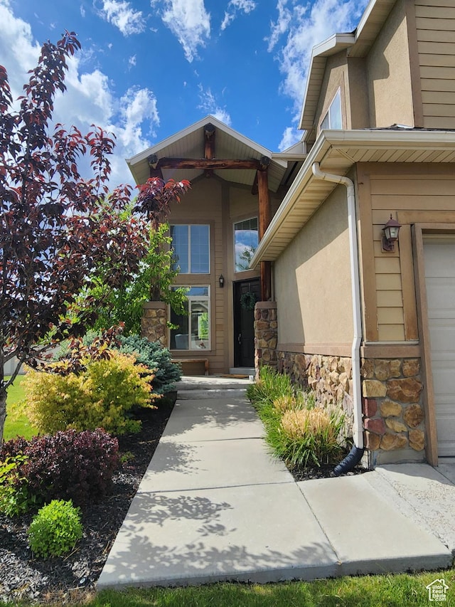 11987 N Cyprus Dr, Highland, UT 84003 - entrance to property featuring stone siding and stucco siding