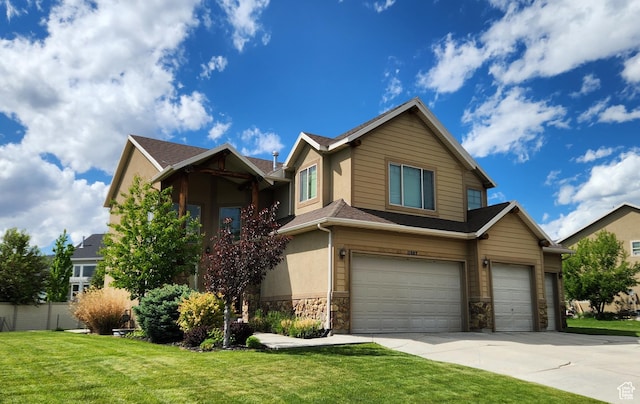 11987 N Cyprus Dr, Highland, UT 84003 - view of front facade with an attached garage, a front lawn, stone siding, concrete driveway, and roof with shingles