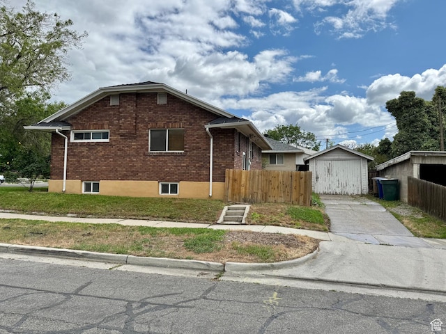 1980 S 600 E, Salt Lake City, UT 84105 - view of home's exterior with brick siding and concrete driveway
