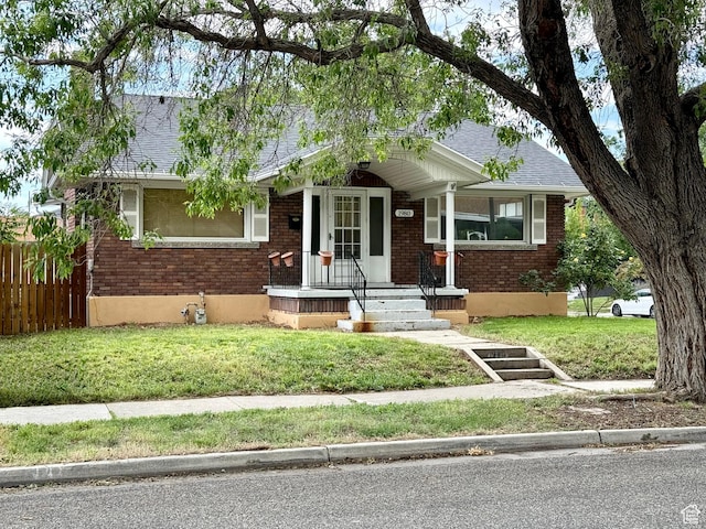 1980 S 600 E, Salt Lake City, UT 84105 - bungalow with brick siding and roof with shingles