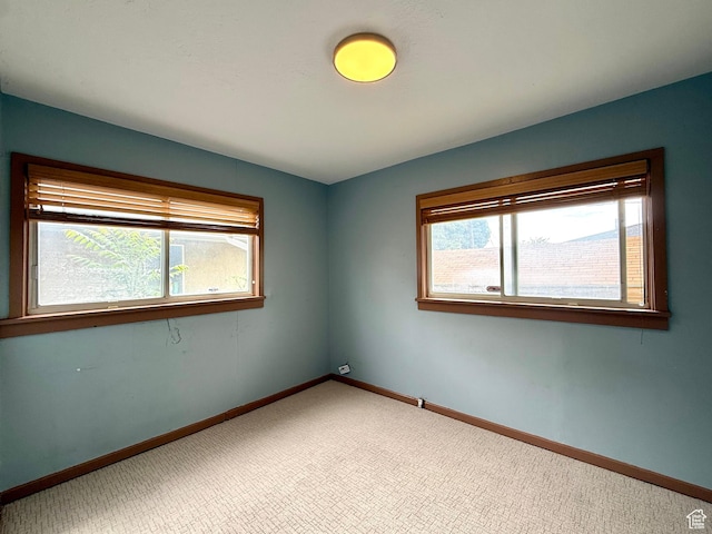 1980 S 600 E, Salt Lake City, UT 84105 - carpeted empty room with baseboards
