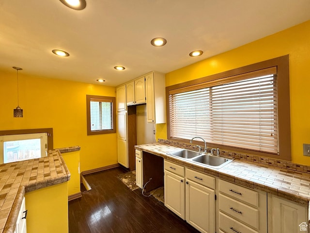 1980 S 600 E, Salt Lake City, UT 84105 - kitchen with a sink, dark wood-style flooring, recessed lighting, hanging light fixtures, and white cabinetry