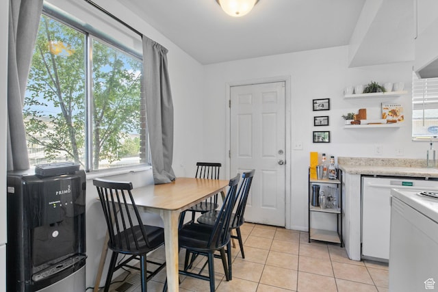 8316 S Carmen Ct E, Sandy, UT 84070 - dining area featuring plenty of natural light and light tile patterned floors