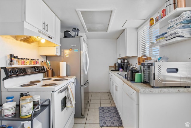 8316 S Carmen Ct E, Sandy, UT 84070 - kitchen featuring white appliances, under cabinet range hood, light countertops, white cabinets, and light tile patterned floors