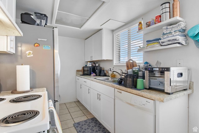 8316 S Carmen Ct E, Sandy, UT 84070 - kitchen with white appliances, a sink, white cabinetry, light tile patterned floors, and light countertops