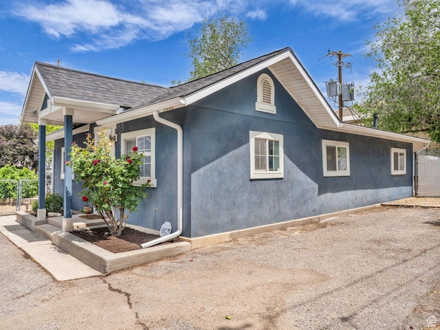 7409 S Main St W, Midvale, UT 84047 - view of side of property featuring stucco siding