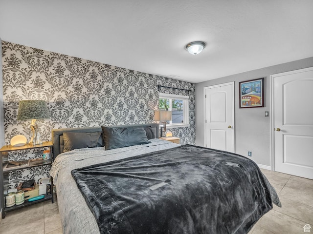 7409 S Main St W, Midvale, UT 84047 - bedroom featuring wallpapered walls, light tile patterned floors, and baseboards