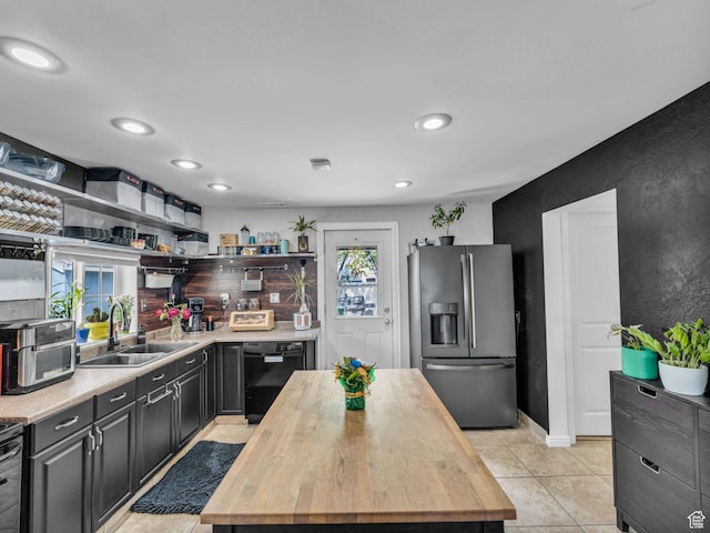 7409 S Main St W, Midvale, UT 84047 - kitchen featuring stainless steel refrigerator with ice dispenser, dishwasher, a sink, open shelves, and wooden counters