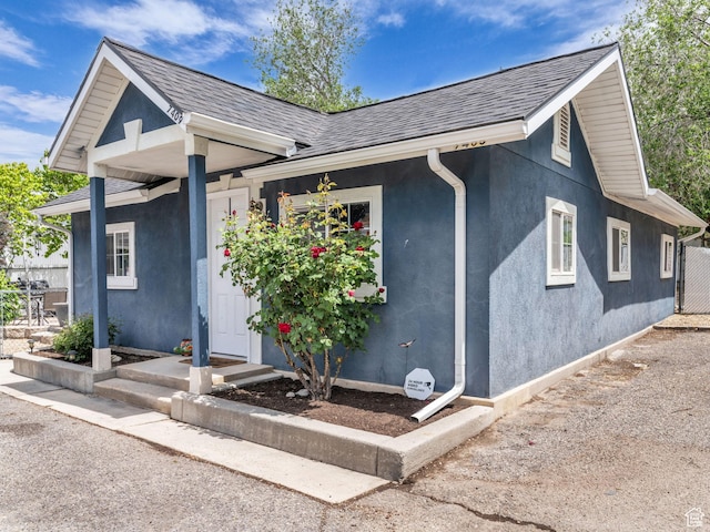7409 S Main St W, Midvale, UT 84047 - single story home featuring stucco siding and a shingled roof
