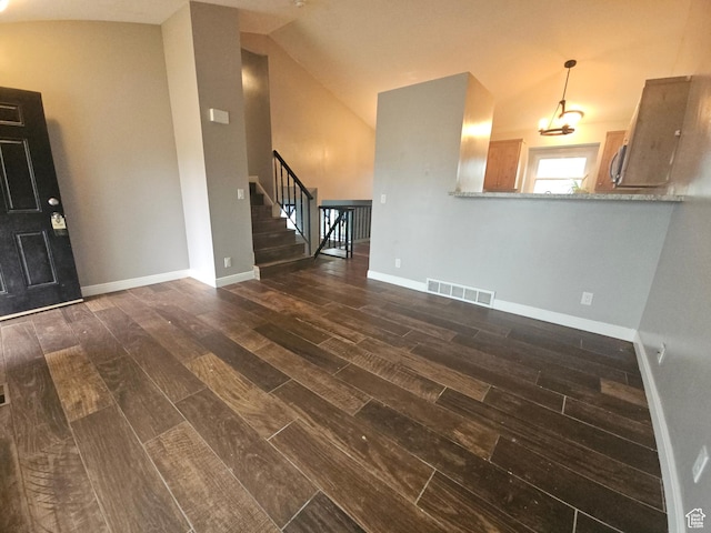 417 W 225 N, Clearfield, UT 84015 - unfurnished living room with wood tiled floors, stairway, lofted ceiling, and baseboards