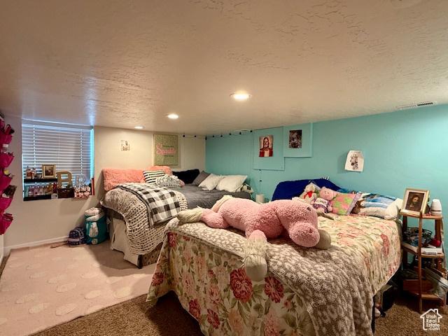 64 S 300 E, Preston, ID 83263 - bedroom with carpet flooring, a textured ceiling, and recessed lighting