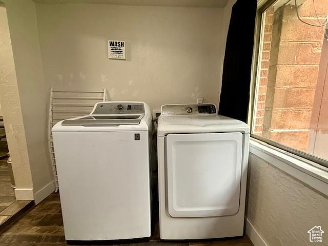 64 S 300 E, Preston, ID 83263 - washroom with washing machine and clothes dryer, dark wood-style flooring, and baseboards