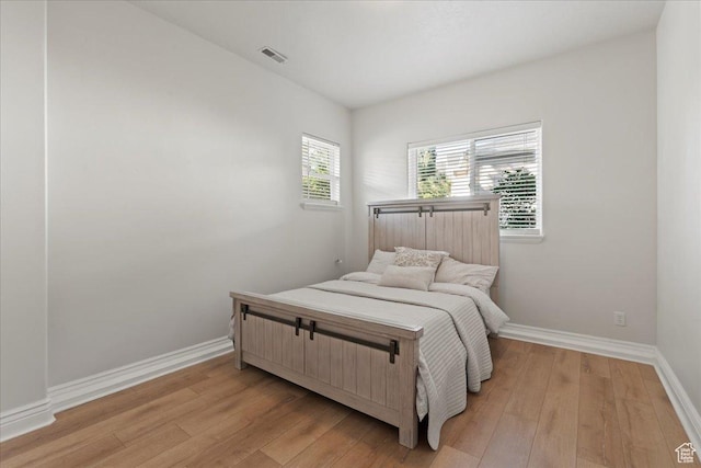 14771 S Brewster Dr, Draper, UT 84020 - bedroom with light wood-type flooring and baseboards