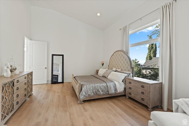 14771 S Brewster Dr, Draper, UT 84020 - bedroom featuring light wood-type flooring and vaulted ceiling