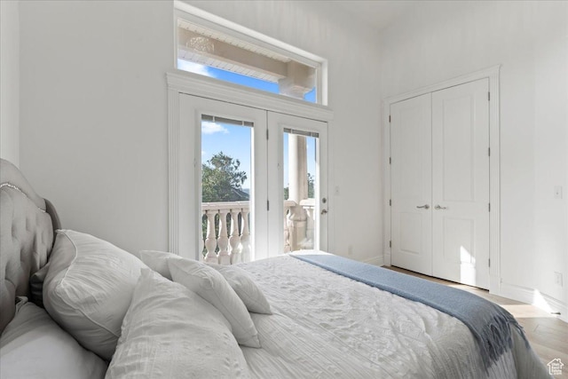 14771 S Brewster Dr, Draper, UT 84020 - bedroom with access to outside, wood finished floors, baseboards, and a closet