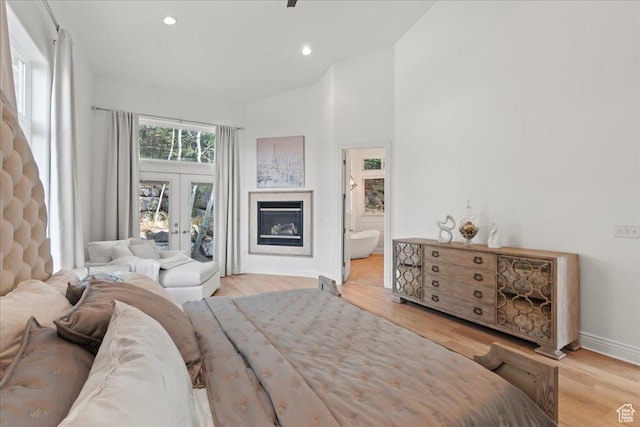 14771 S Brewster Dr, Draper, UT 84020 - bedroom featuring access to exterior, wood finished floors, baseboards, recessed lighting, and french doors
