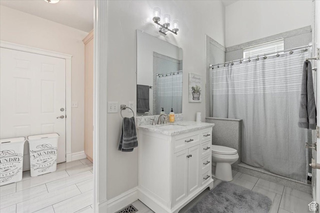 14771 S Brewster Dr, Draper, UT 84020 - full bath with vanity, tile patterned floors, a shower with shower curtain, toilet, and baseboards
