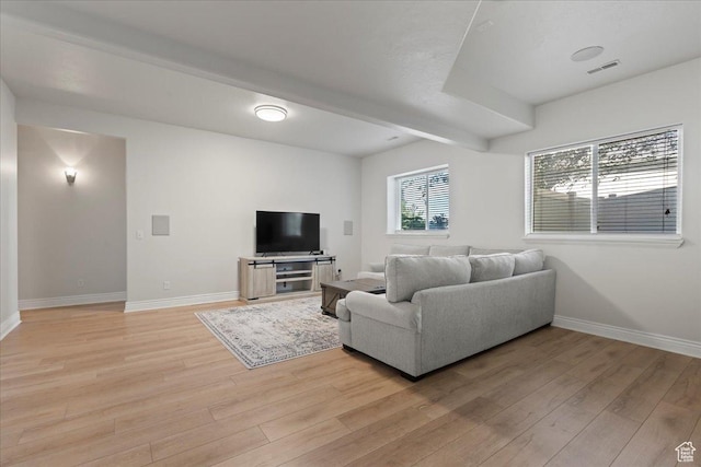 14771 S Brewster Dr, Draper, UT 84020 - living room featuring light wood-style flooring, baseboards, and beamed ceiling