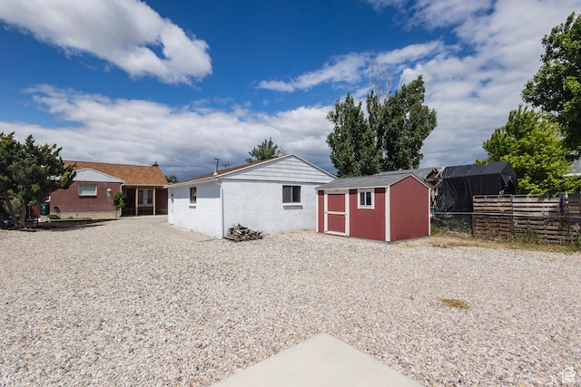 595 W Winchester St, Murray, UT 84123 - rear view of house with concrete block siding