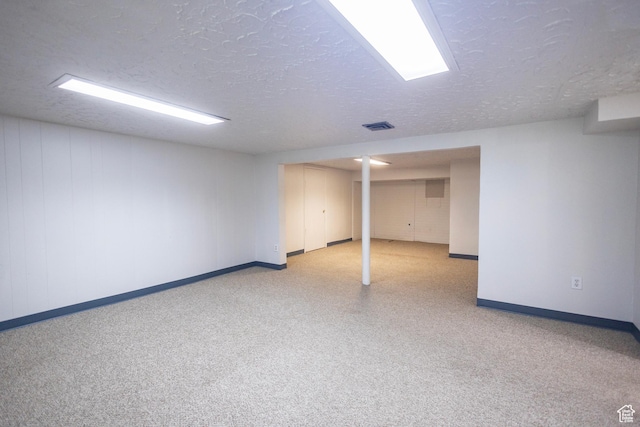 595 W Winchester St, Murray, UT 84123 - finished basement featuring baseboards and a textured ceiling