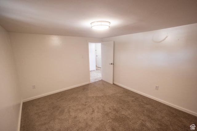 595 W Winchester St, Murray, UT 84123 - carpeted empty room with baseboards