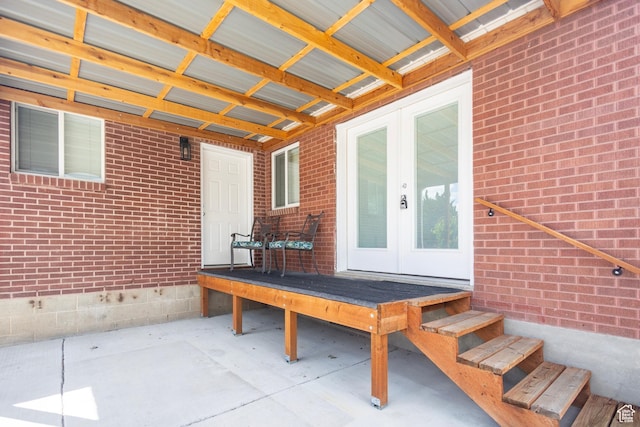 595 W Winchester St, Murray, UT 84123 - view of patio featuring french doors and a deck
