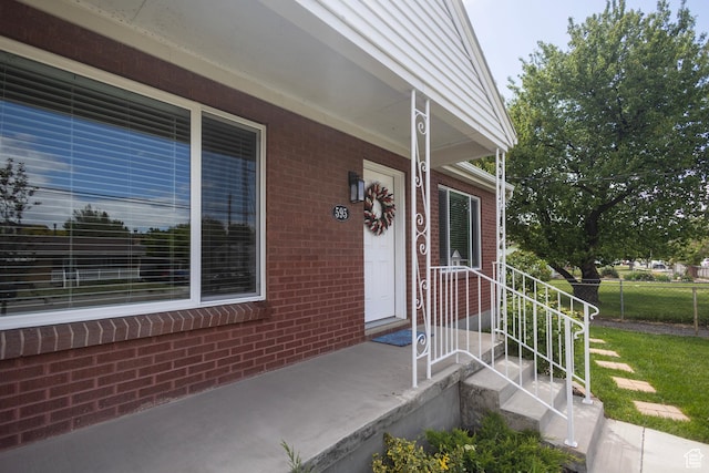 595 W Winchester St, Murray, UT 84123 - view of exterior entry with brick siding