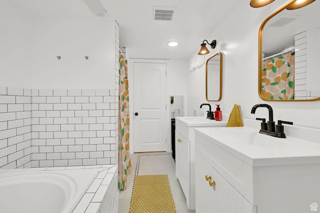 2890 Wheelock Ave, Ogden, UT 84403 - bathroom with two vanities, a relaxing tiled tub, tile patterned floors, curtained shower, and recessed lighting