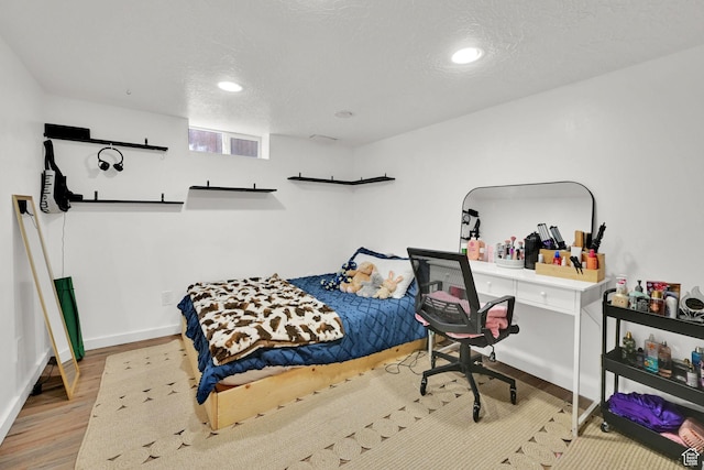 2890 Wheelock Ave, Ogden, UT 84403 - bedroom featuring wood finished floors, recessed lighting, and baseboards
