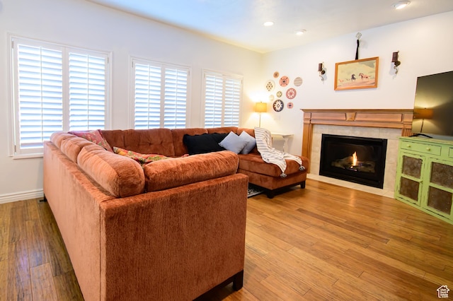 2763 N Hills Dr, Layton, UT 84040 - living room featuring a tile fireplace, wood finished floors, recessed lighting, and baseboards