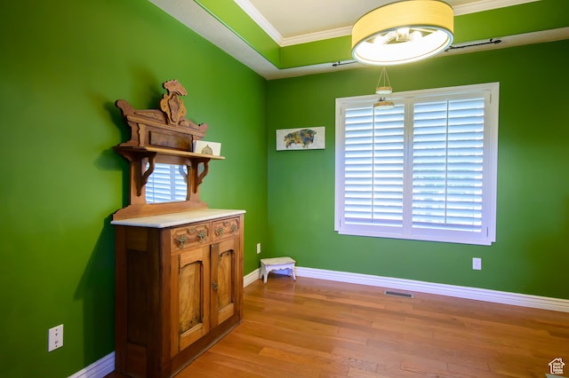 2763 N Hills Dr, Layton, UT 84040 - dining room featuring ornamental molding, light wood finished floors, plenty of natural light, and baseboards