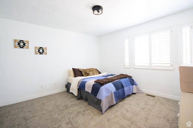 2763 N Hills Dr, Layton, UT 84040 - carpeted bedroom with multiple windows and baseboards