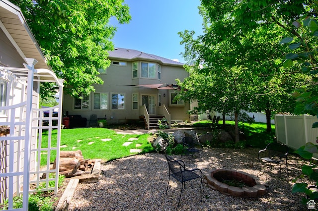2763 N Hills Dr, Layton, UT 84040 - view of yard featuring a fire pit and entry steps