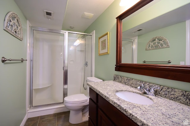 2763 N Hills Dr, Layton, UT 84040 - full bathroom with vanity, tile patterned flooring, a stall shower, and toilet