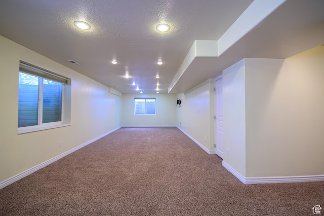 2763 N Hills Dr, Layton, UT 84040 - below grade area featuring carpet flooring, a textured ceiling, recessed lighting, and baseboards