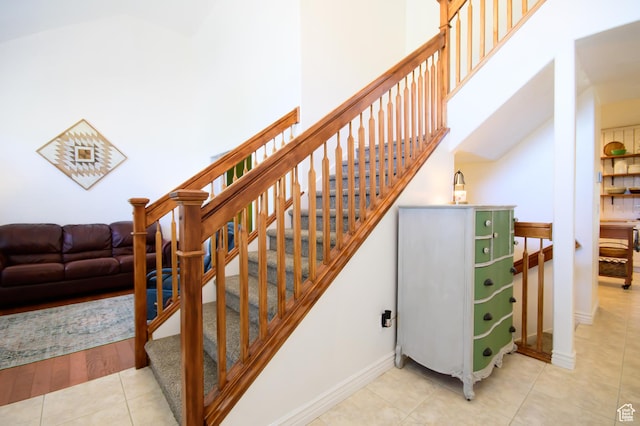 2763 N Hills Dr, Layton, UT 84040 - stairway featuring tile patterned floors and baseboards