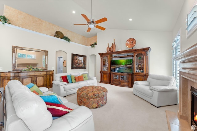 531 W Glendon Way, Pleasant Grove, UT 84062 - living room with arched walkways, a high end fireplace, a ceiling fan, light carpet, and recessed lighting