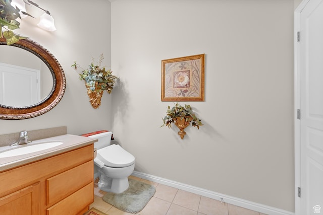 531 W Glendon Way, Pleasant Grove, UT 84062 - half bathroom featuring vanity, toilet, tile patterned flooring, and baseboards