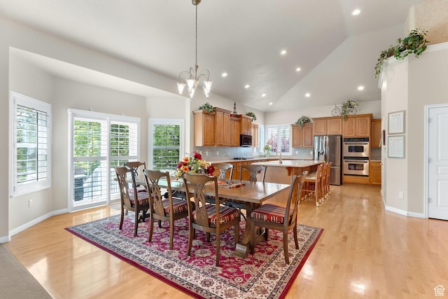 531 W Glendon Way, Pleasant Grove, UT 84062 - dining area featuring light wood-style floors, recessed lighting, a chandelier, baseboards, and lofted ceiling