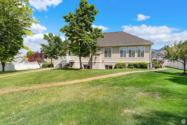 531 W Glendon Way, Pleasant Grove, UT 84062 - rear view of house featuring stucco siding and a shingled roof