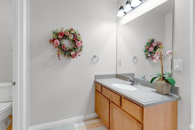 531 W Glendon Way, Pleasant Grove, UT 84062 - bathroom featuring vanity, toilet, and tile patterned floors