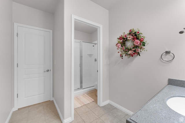531 W Glendon Way, Pleasant Grove, UT 84062 - bathroom with a shower stall, tile patterned flooring, toilet, and baseboards